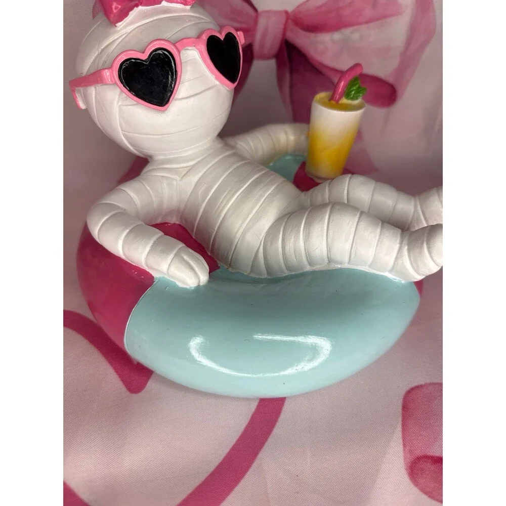SummerWeen/Halloween Mummy on Pool Float with a Cocktail